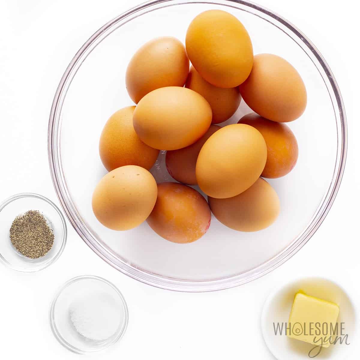 Ingredients to make basic baked eggs.