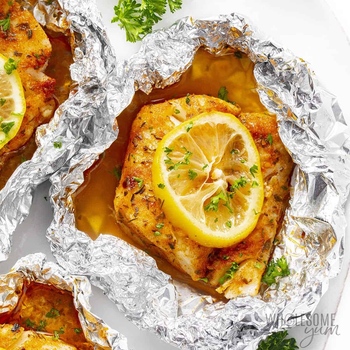 Fully grilled cod in foil.