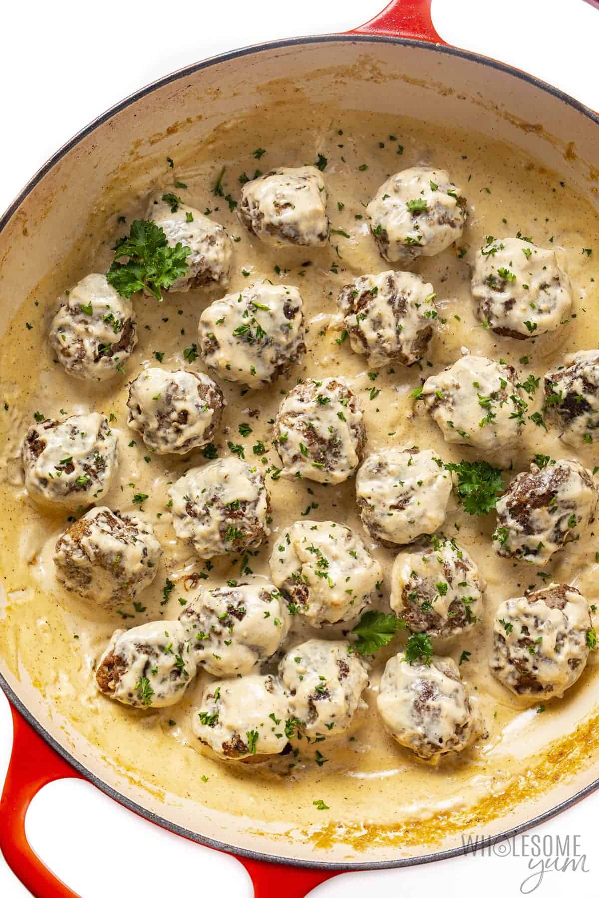 Finished keto Swedish meatballs with sauce in pan.