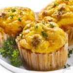Sausage egg muffins close up on a plate.