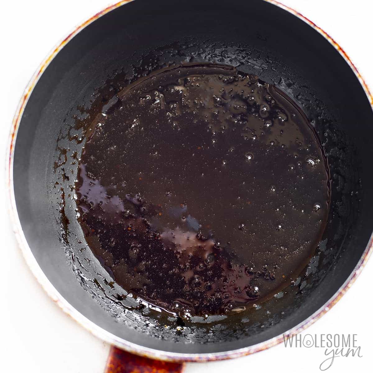 Balsamic glaze in a pan.
