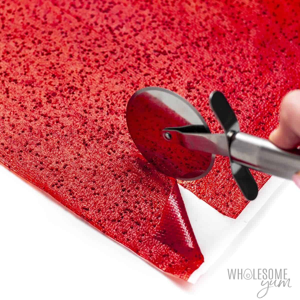 Fruit roll ups sliced with pizza cutter.