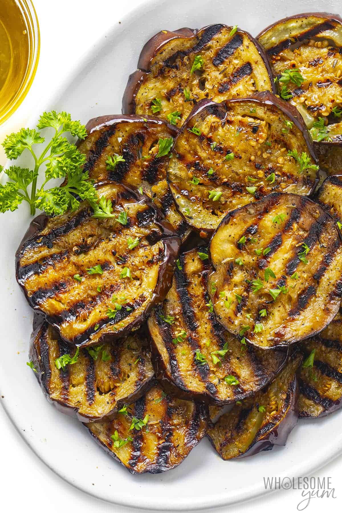 Grilled eggplant on a platter.