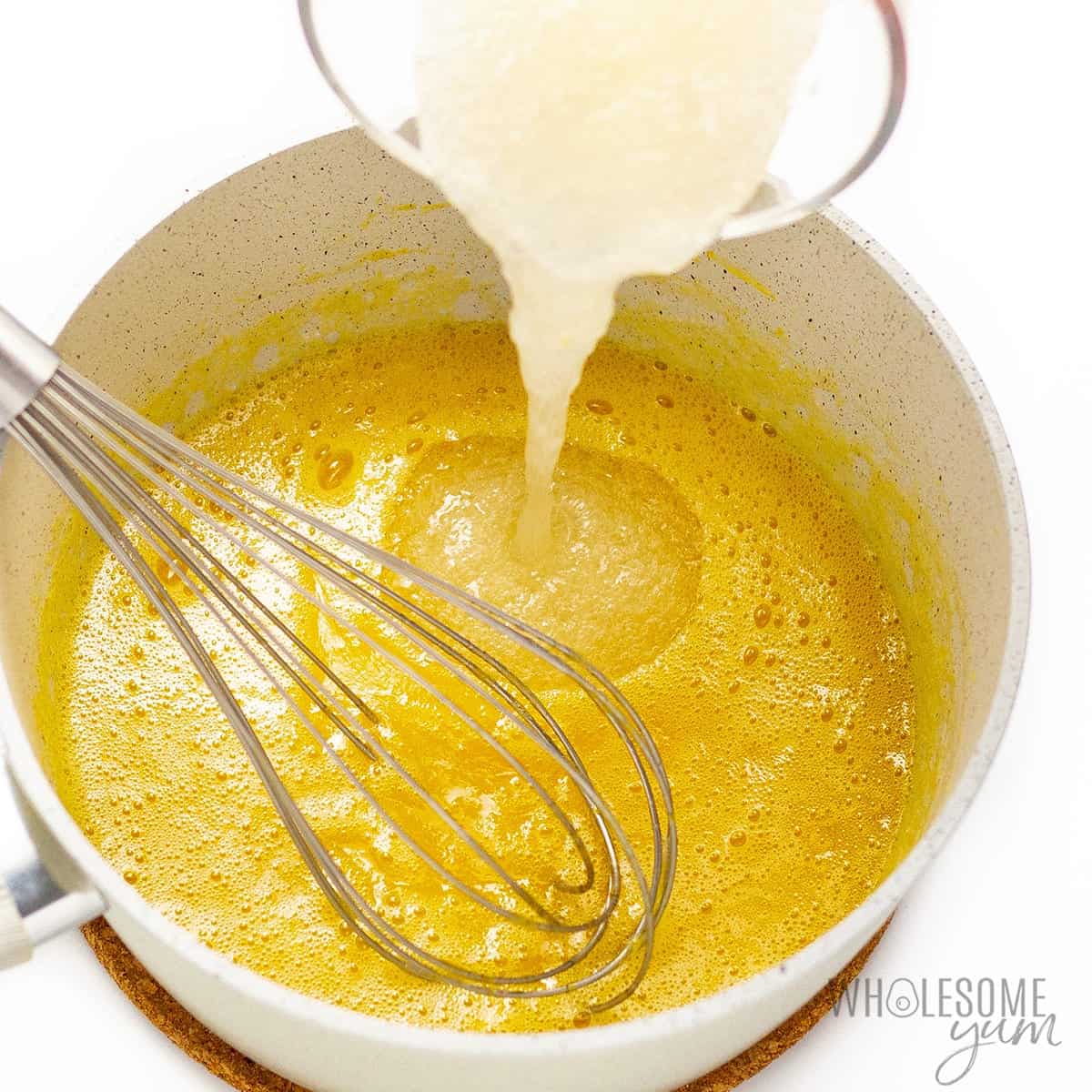 Pour the gelatin mixture into the lemon juice mixture in the saucepan.