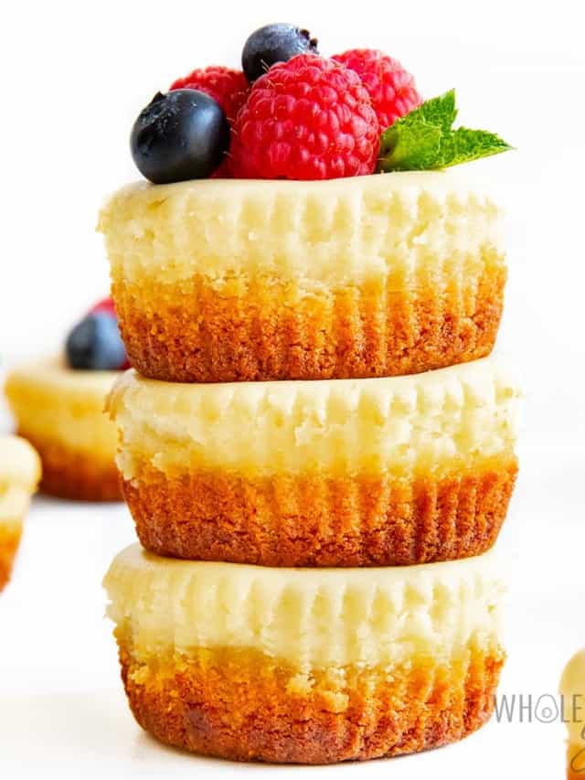 Keto mini cheesecake bites stacked up close.