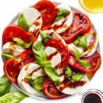 Caprese salad recipe laid out on a plate.