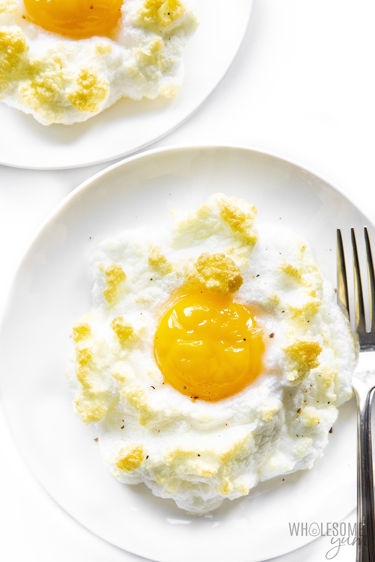 Cloud eggs on plates.
