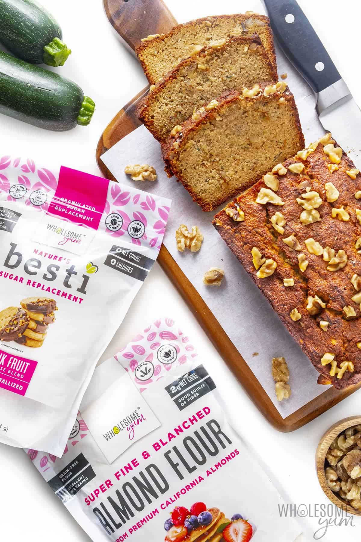 Healthy zucchini bread recipe next to bag of Besti and Wholesome Yum Almond Flour.