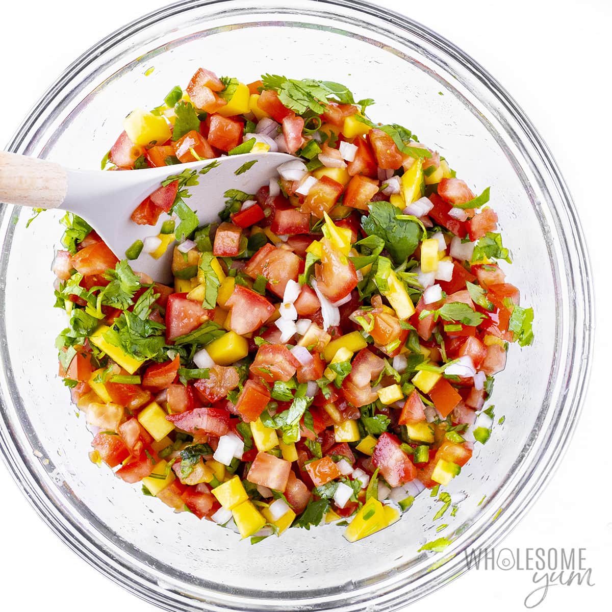 Fully mixed salsa in a bowl.