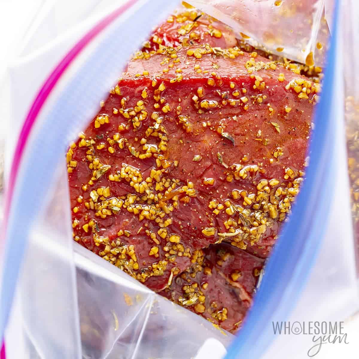 Marinade poured into bag with steaks.