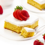 Healthy keto tres leches cake on a plate with a fork.
