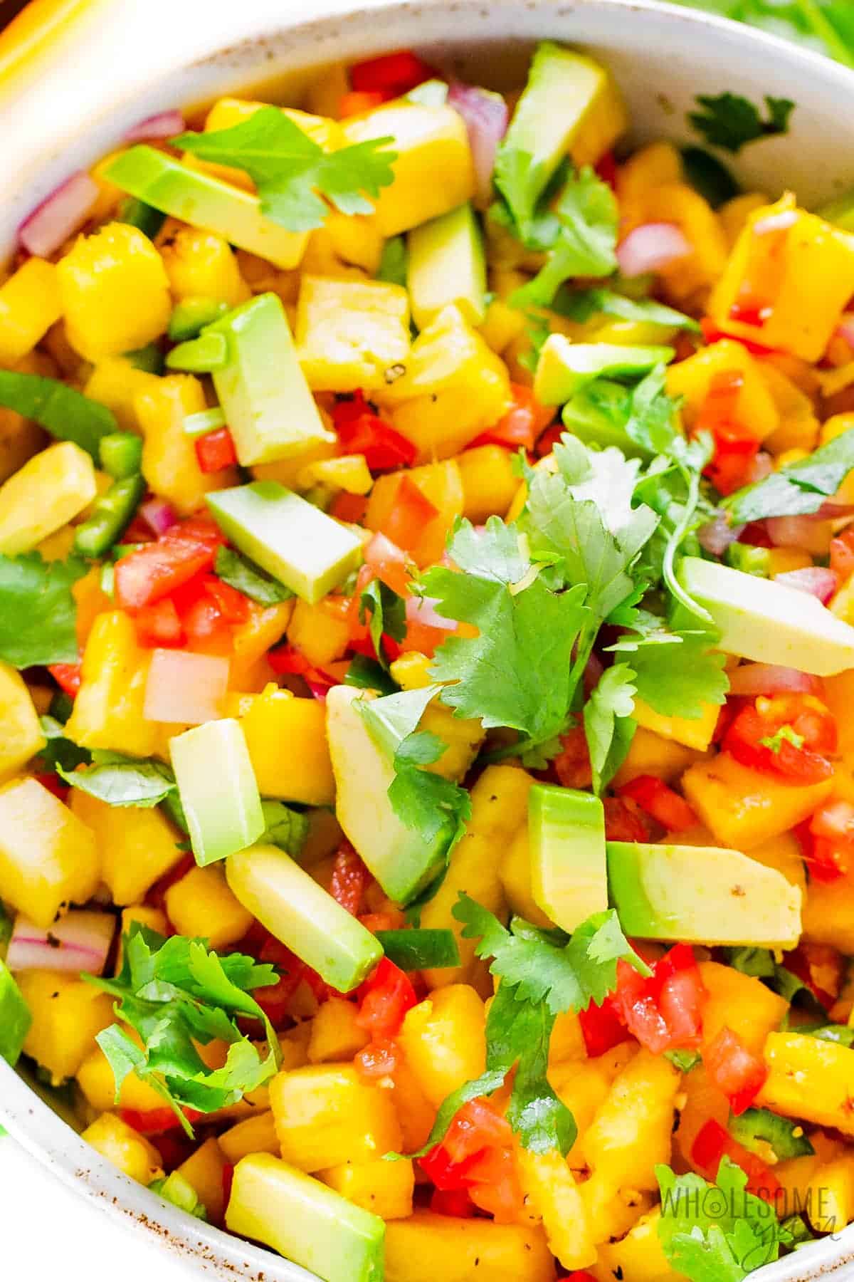 Close up of a pineapple salsa garnished with cilantro recipe.