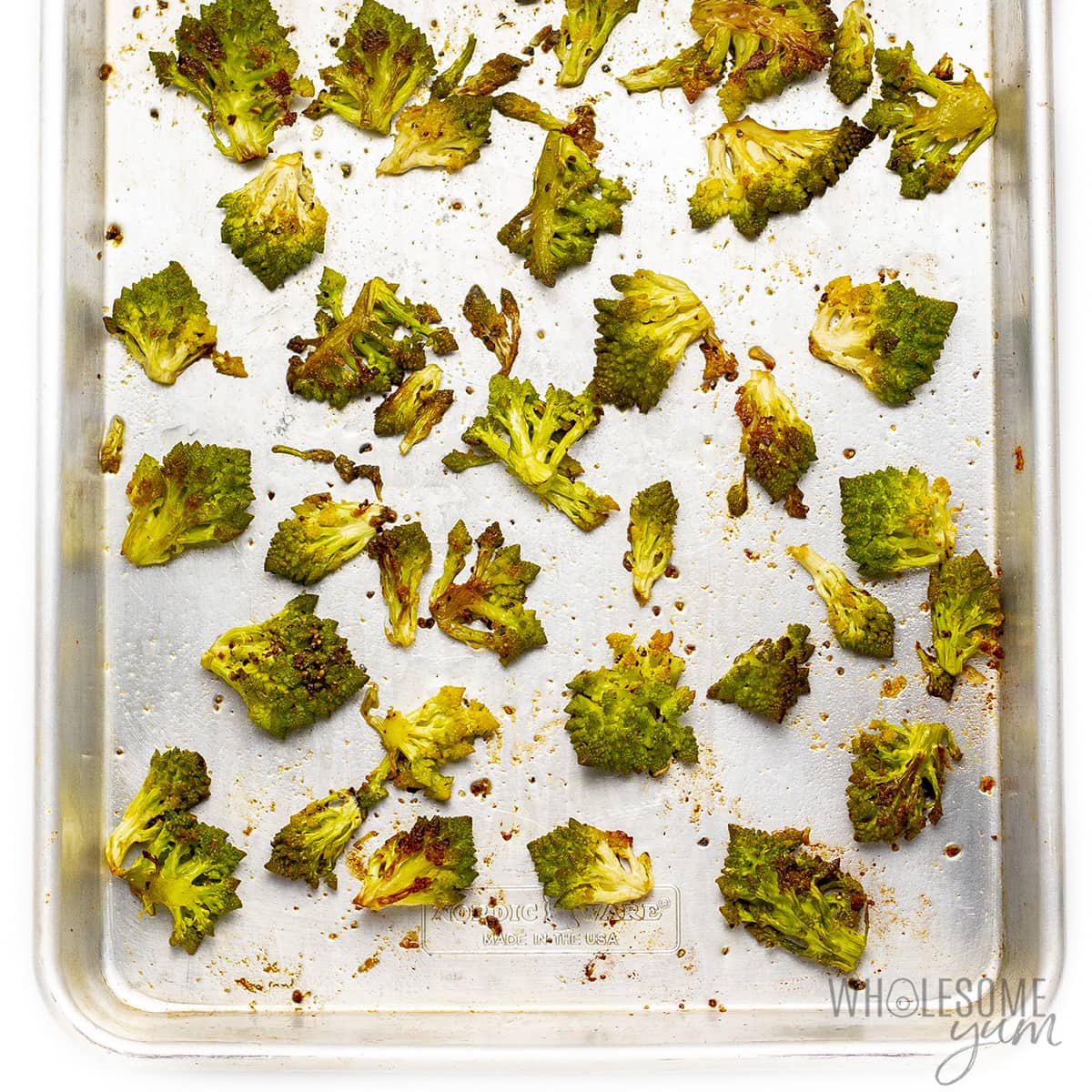 Fully cooked romanesco on a baking pan.