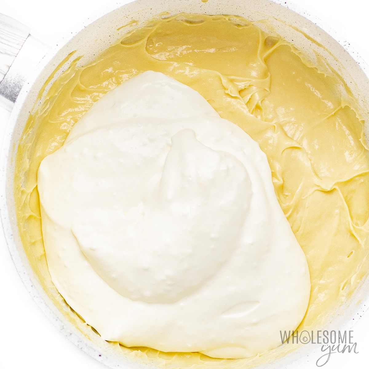 Whipped cream mixed in to pudding base.