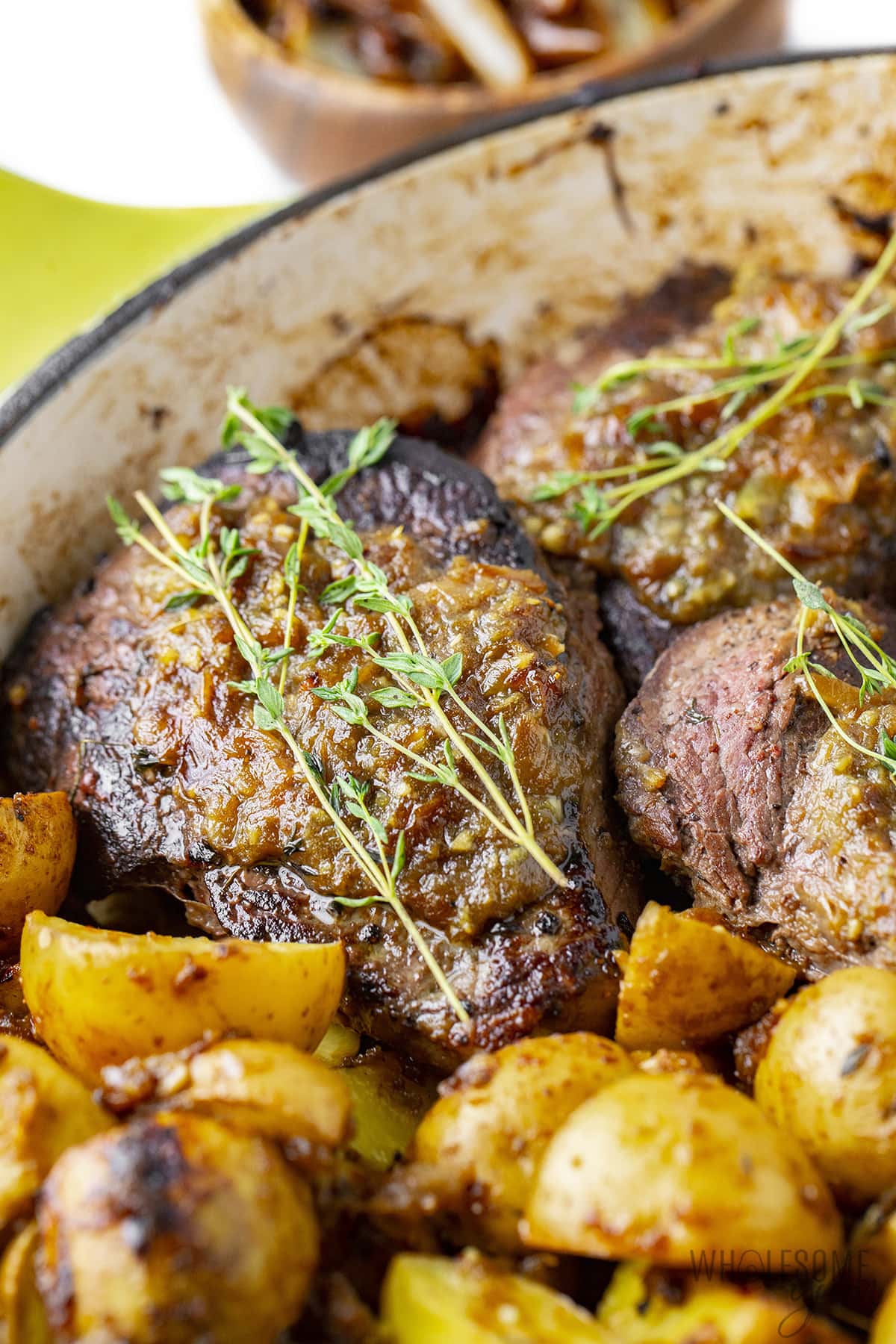 Steak and potatoes recipe in a pan.