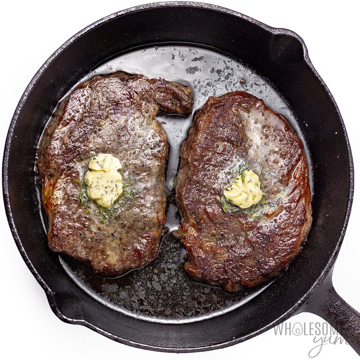 Chuck's eye steak topped with butter.