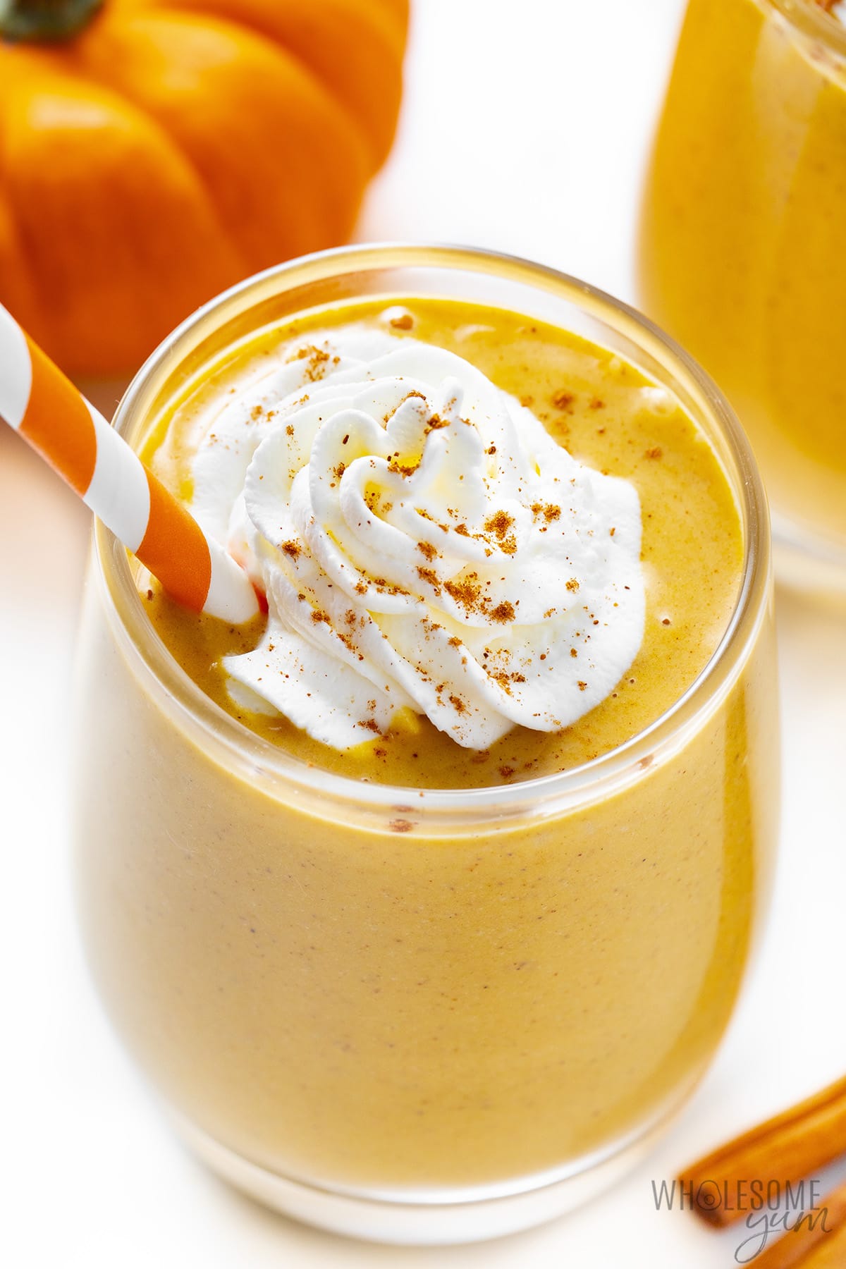 Overhead view of pumpkin smoothie recipe in a glass.
