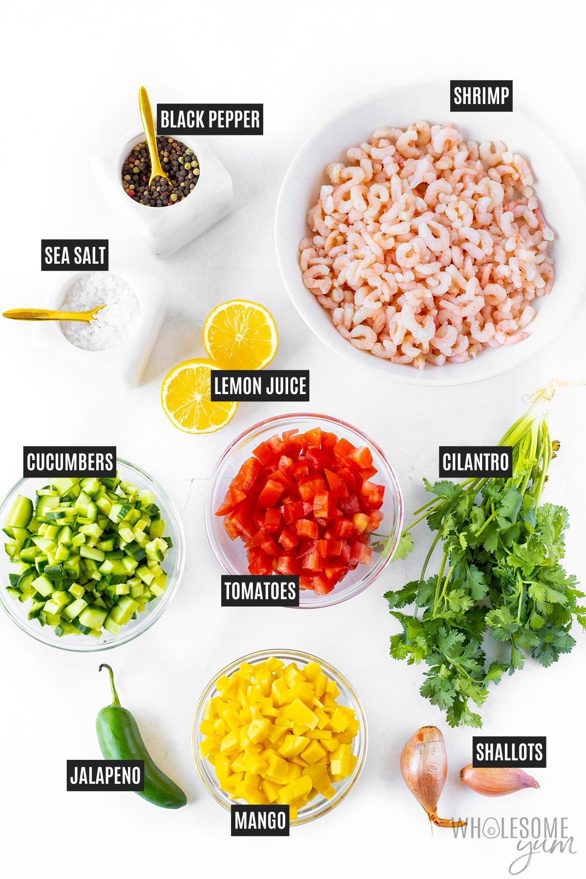 Shrimp ceviche ingredients in bowls.