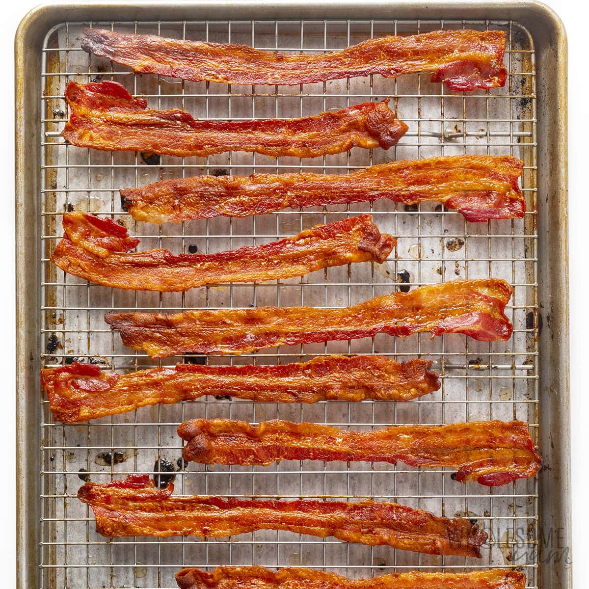 Bacon on a rack after baking in the oven