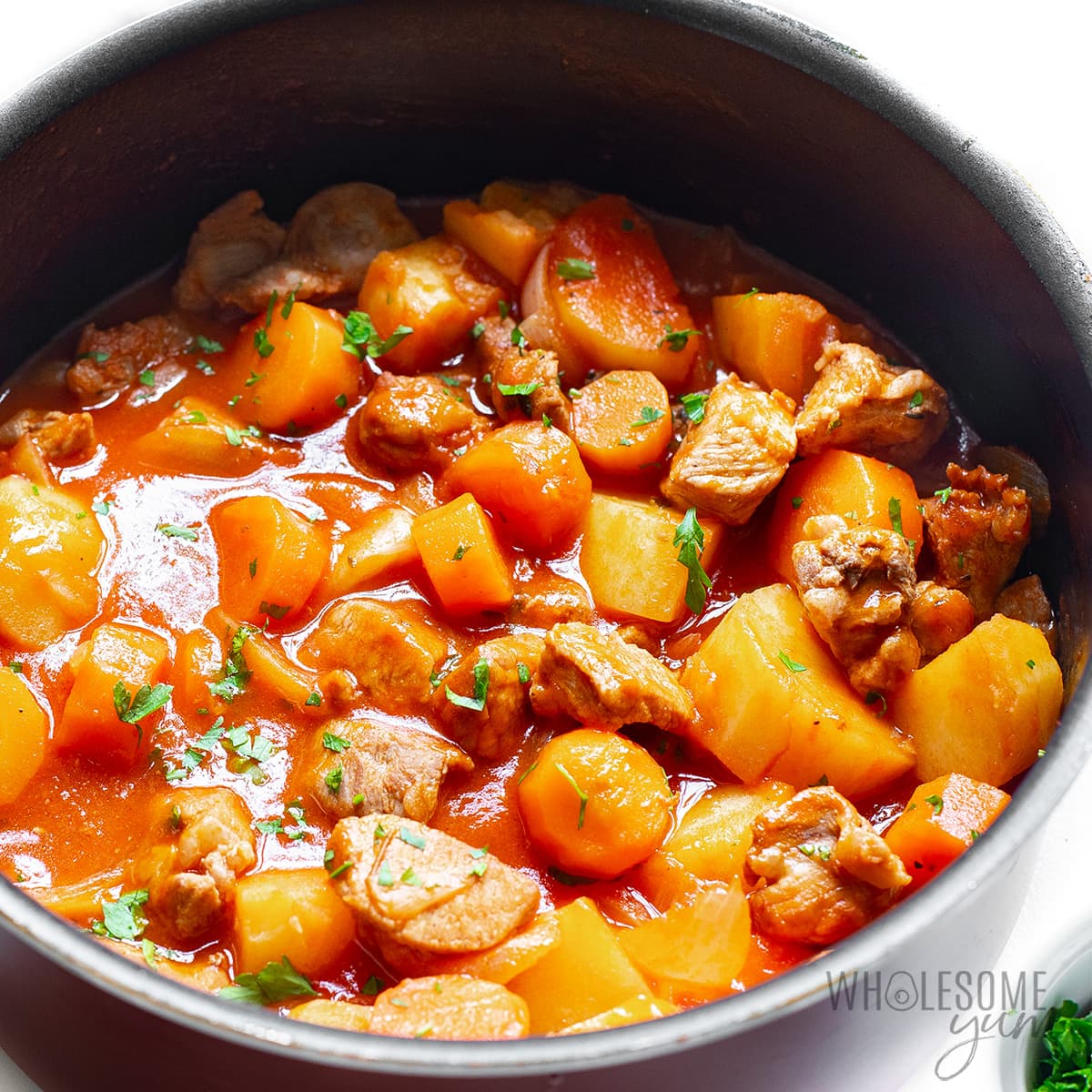 Pork stew recipe in a saucepan.