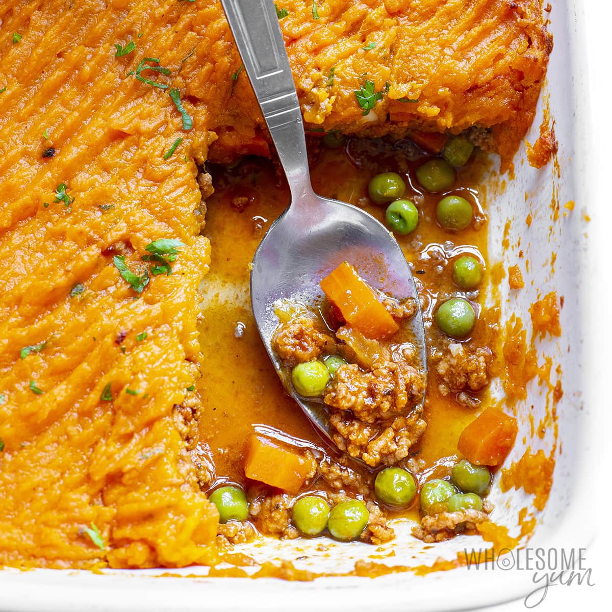 Shepherd's pie with sweet potato finished with spoon.