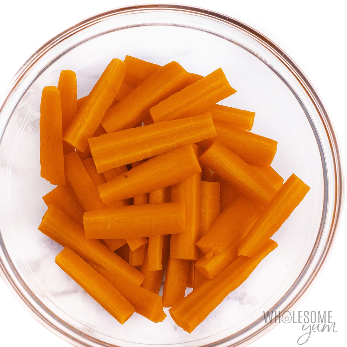 Carrots cut and sliced in a bowl. 