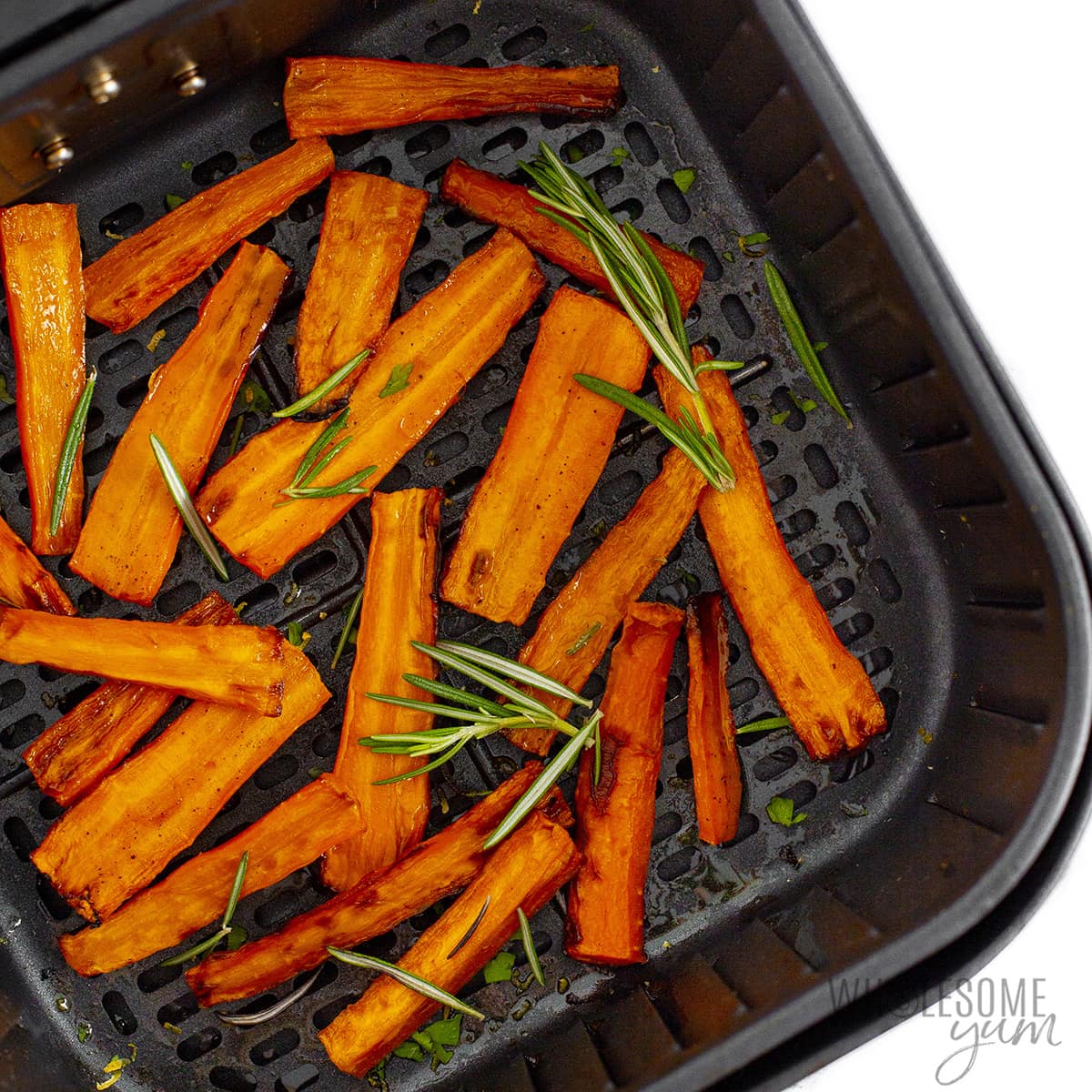Air fryer carrots in basket.