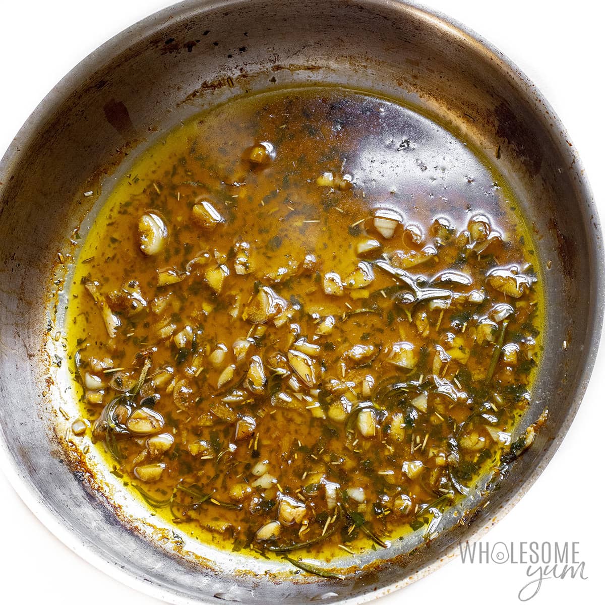 Sauteing the garlic in sauce.
