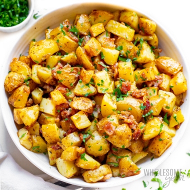 Oven roasted potatoes recipe in a bowl.
