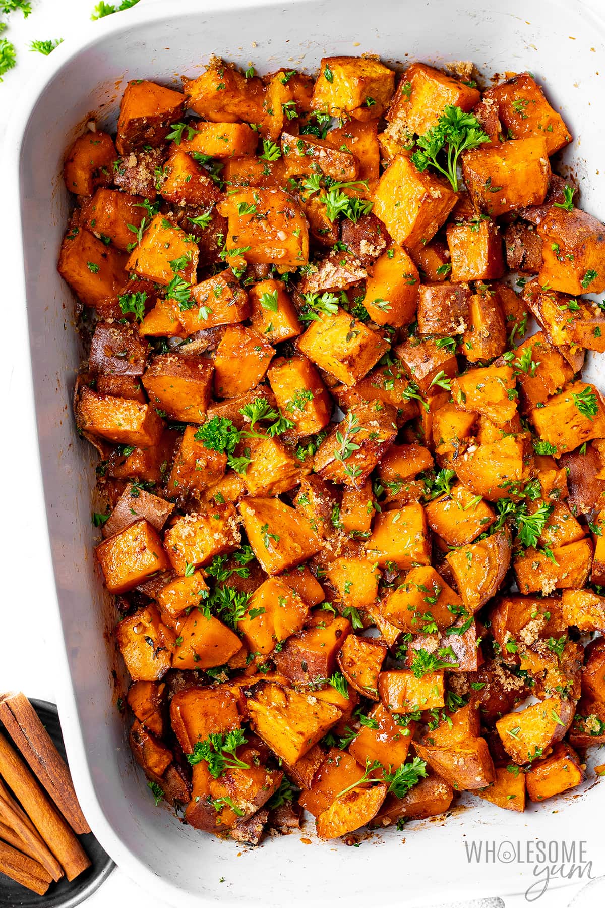Oven roasted sweet potatoes mixed with butter and herbs.