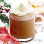 A cup of sugar-free peppermint mocha creamer with coffee and whipped cream.
