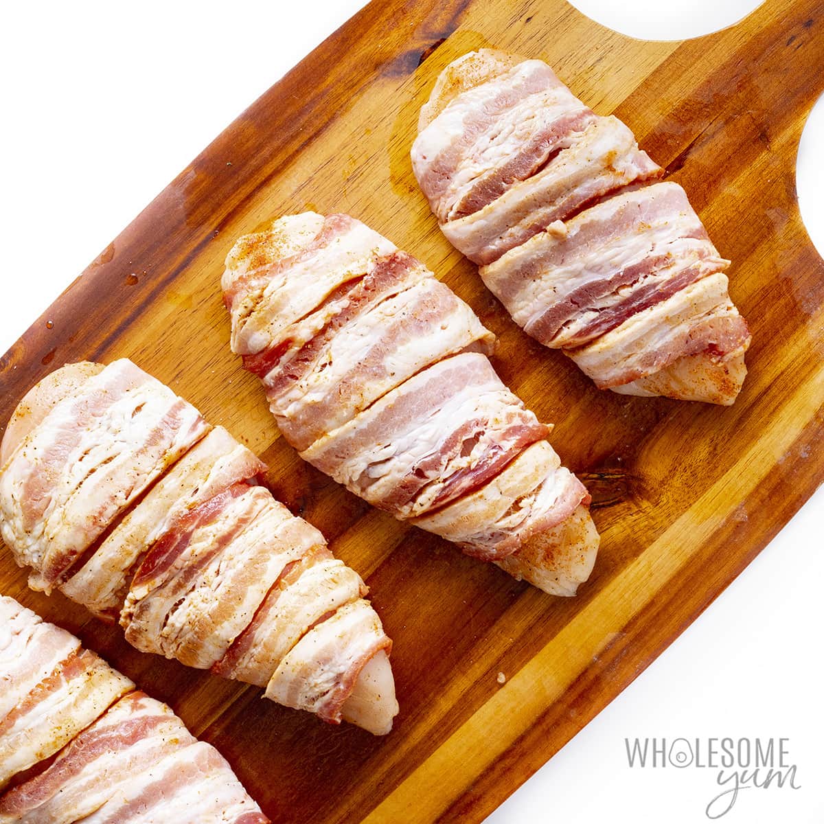 Chicken breasts wrapped with bacon.