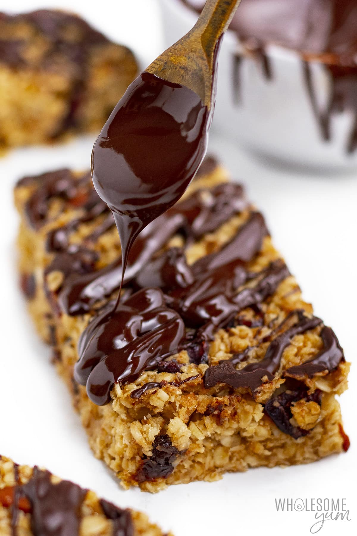 Chocolate drizzled over oatmeal breakfast bars.
