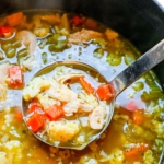 Turkey soup recipe in a ladle.