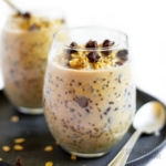 Peanut butter overnight oats in a glass cup.