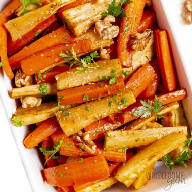 Roasted carrots and parsnips in a serving platter.