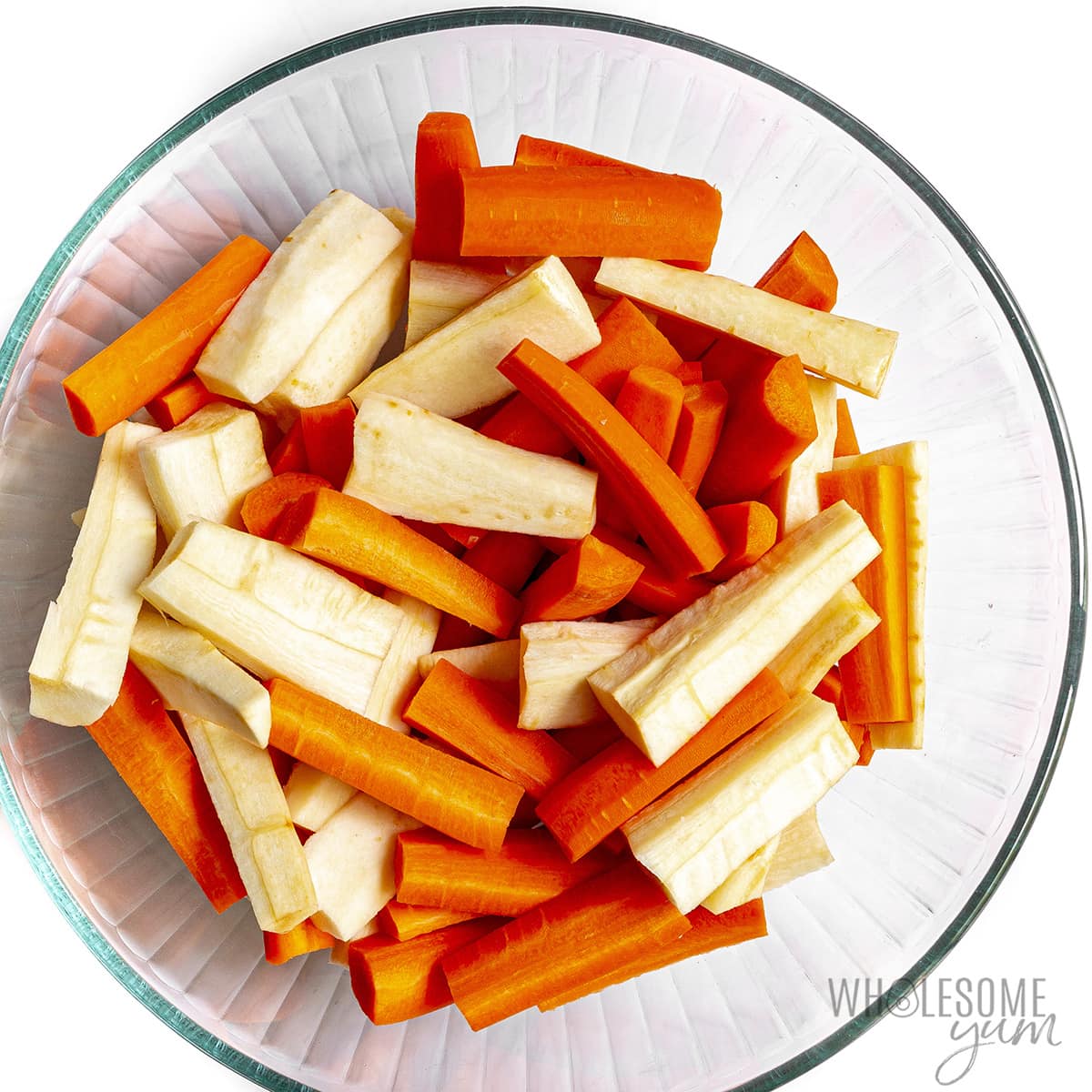 Chopped carrots and parsnips in a bowl. 
