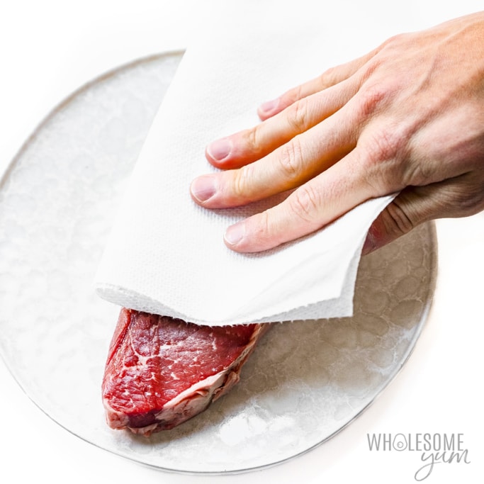 Steak patted dry with paper towel.