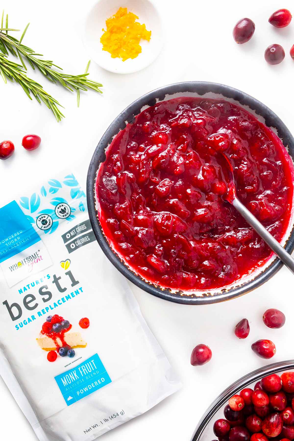 Bowl of cranberry sauce with Besti powdered.