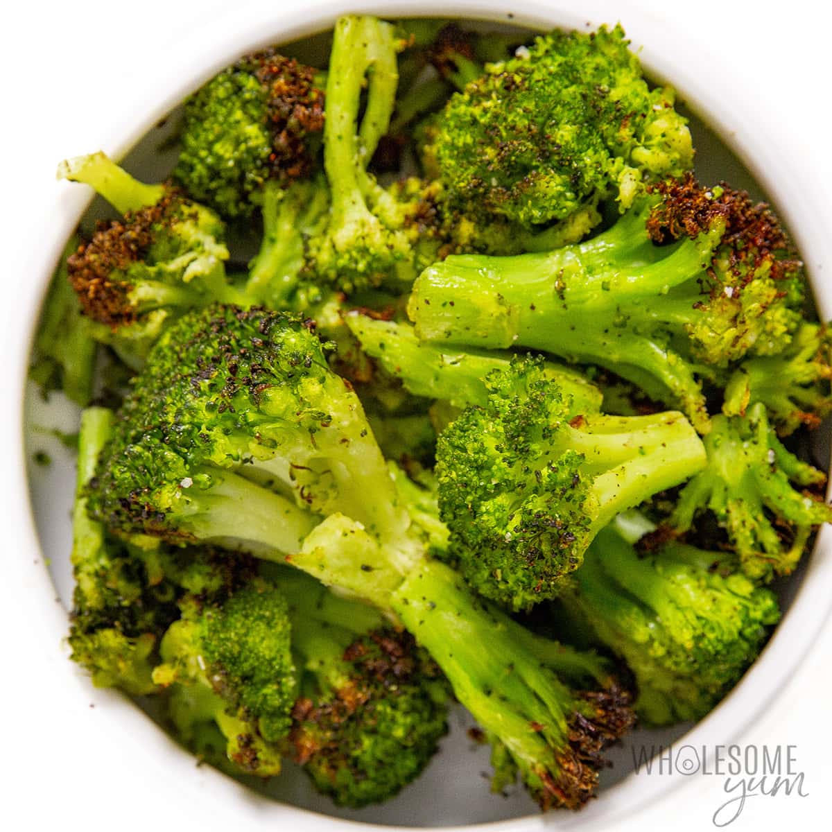 Air fryer frozen broccoli in a bowl.