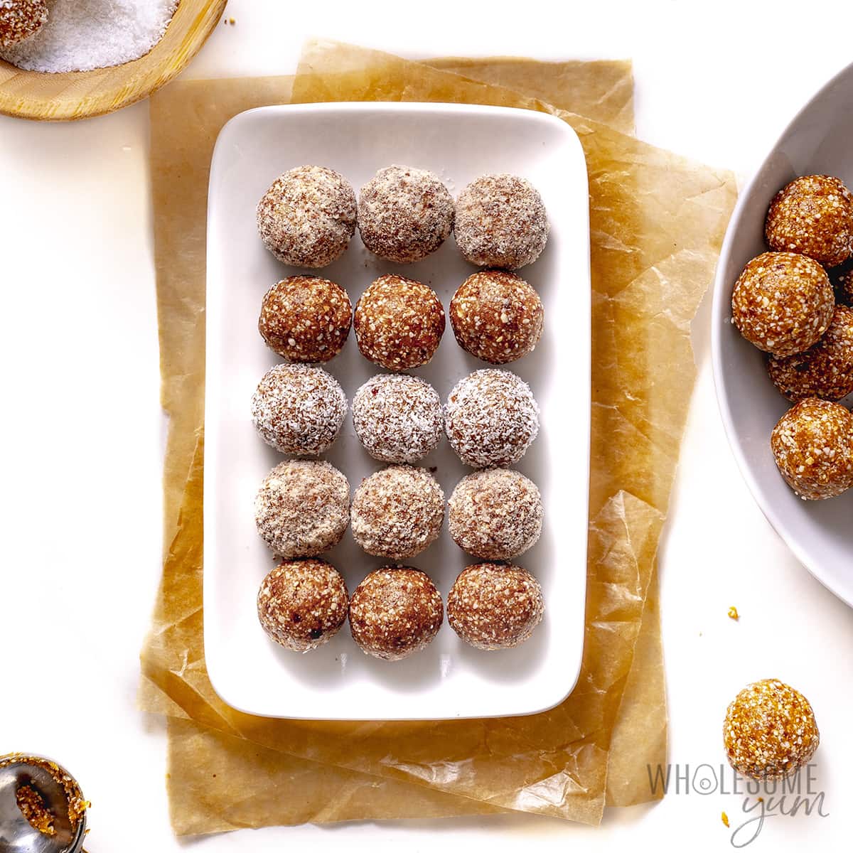 Bliss balls rolled in coconut and almond flour.