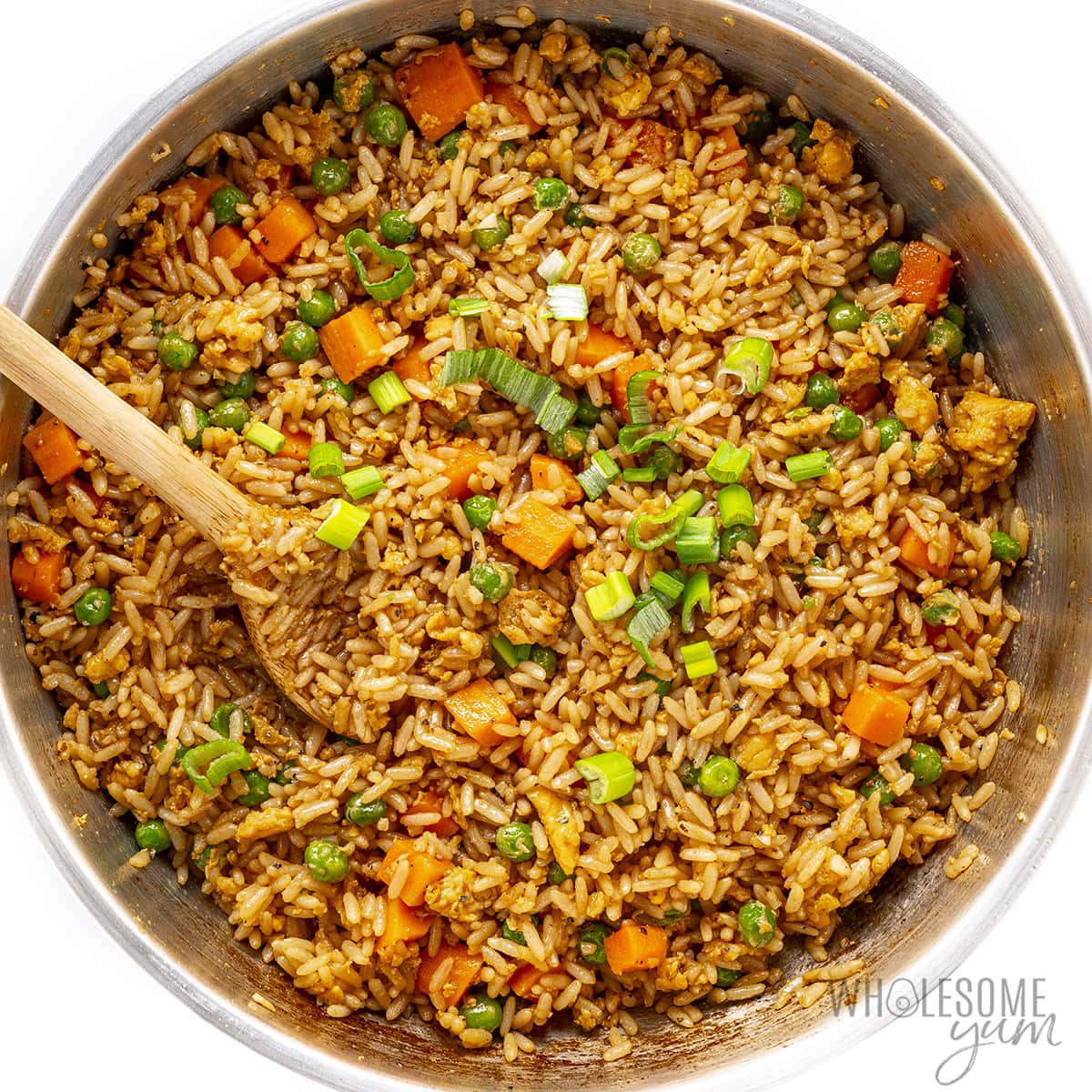 Finished easy fried rice recipe with garnish.