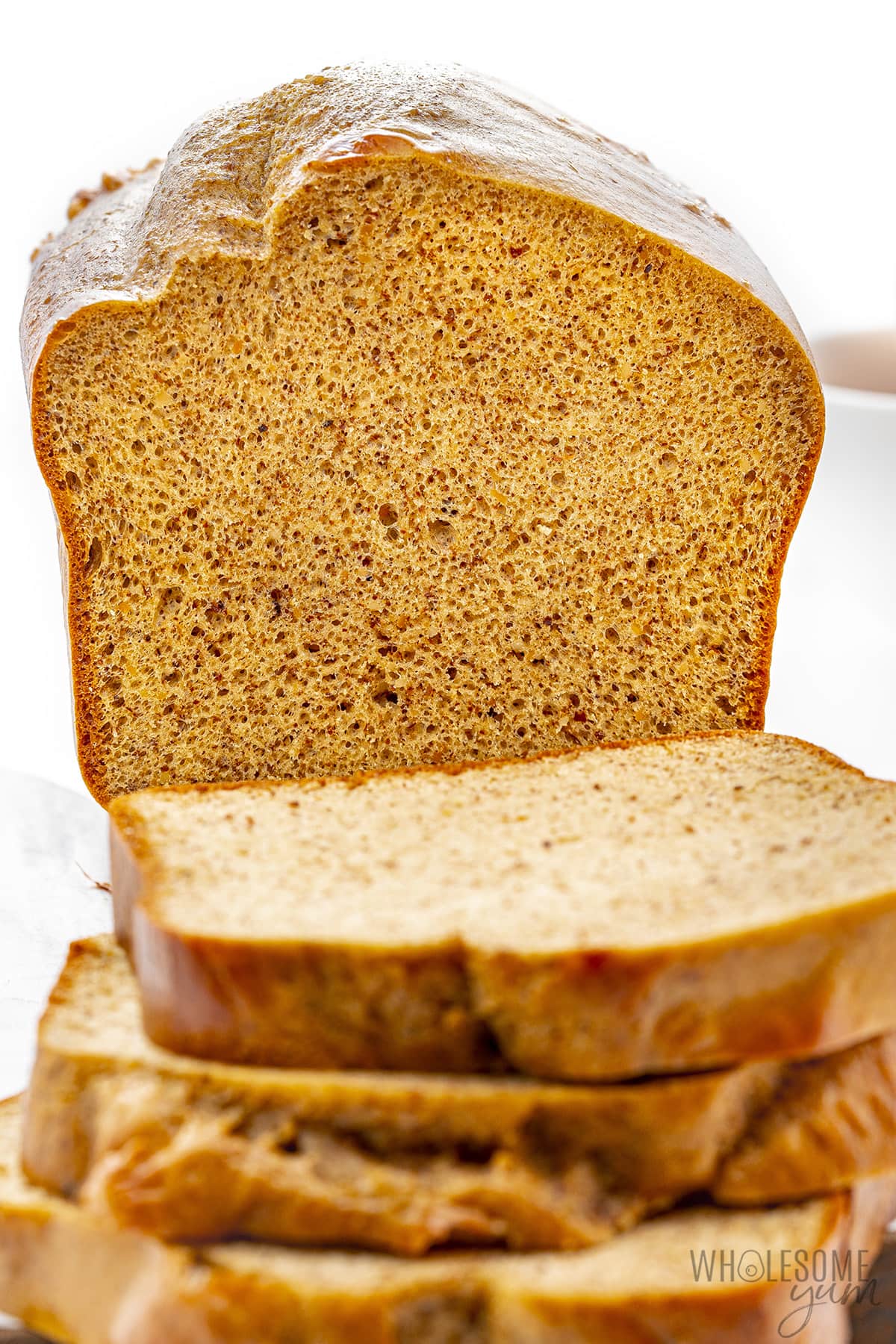 Loaf of protein bread cut into slices. 