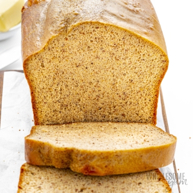Flourless protein bread loaf with slices.