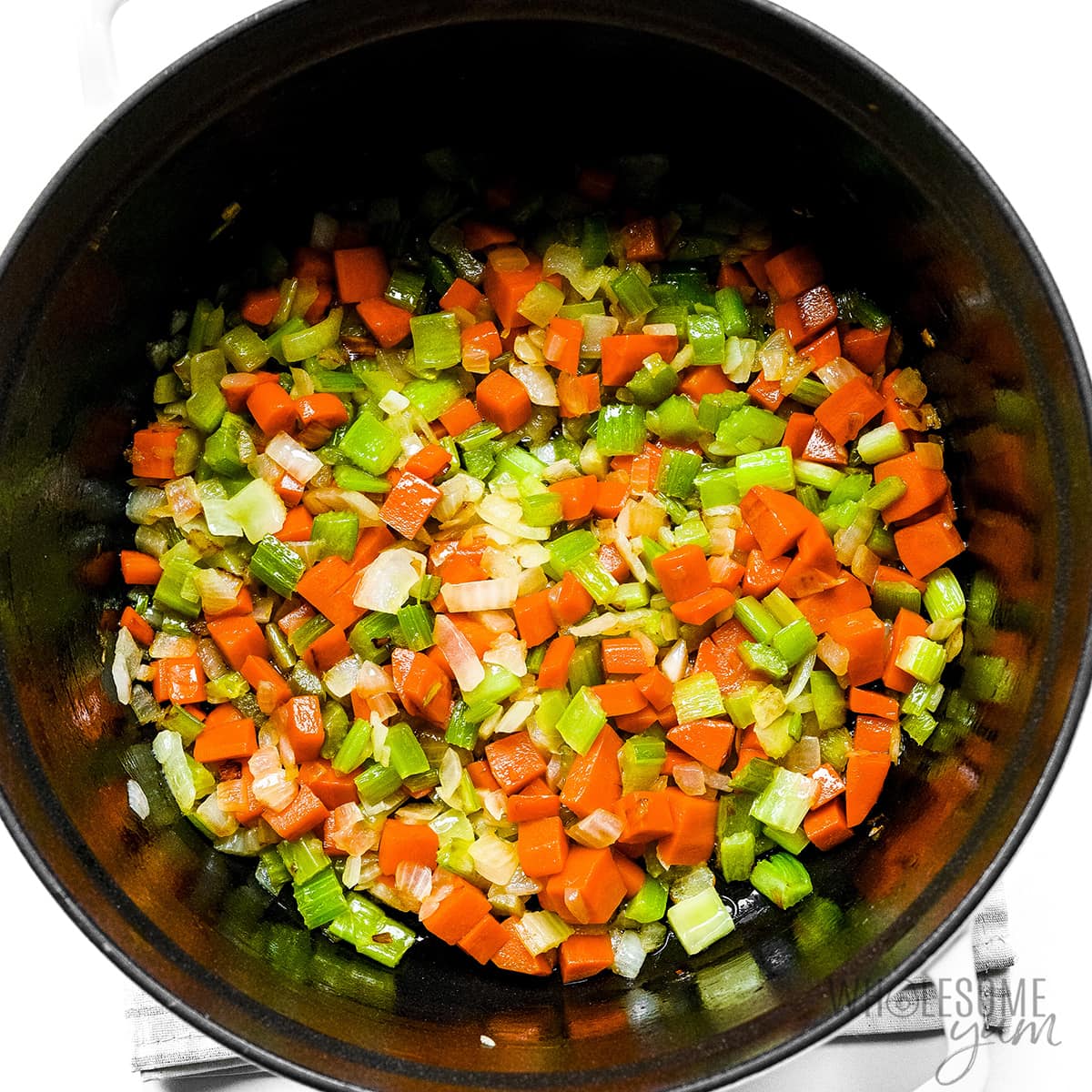 Cooked vegetables in a pot.