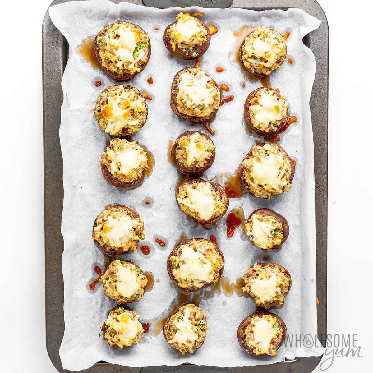 Baked stuffed mushrooms recipe on the pan.