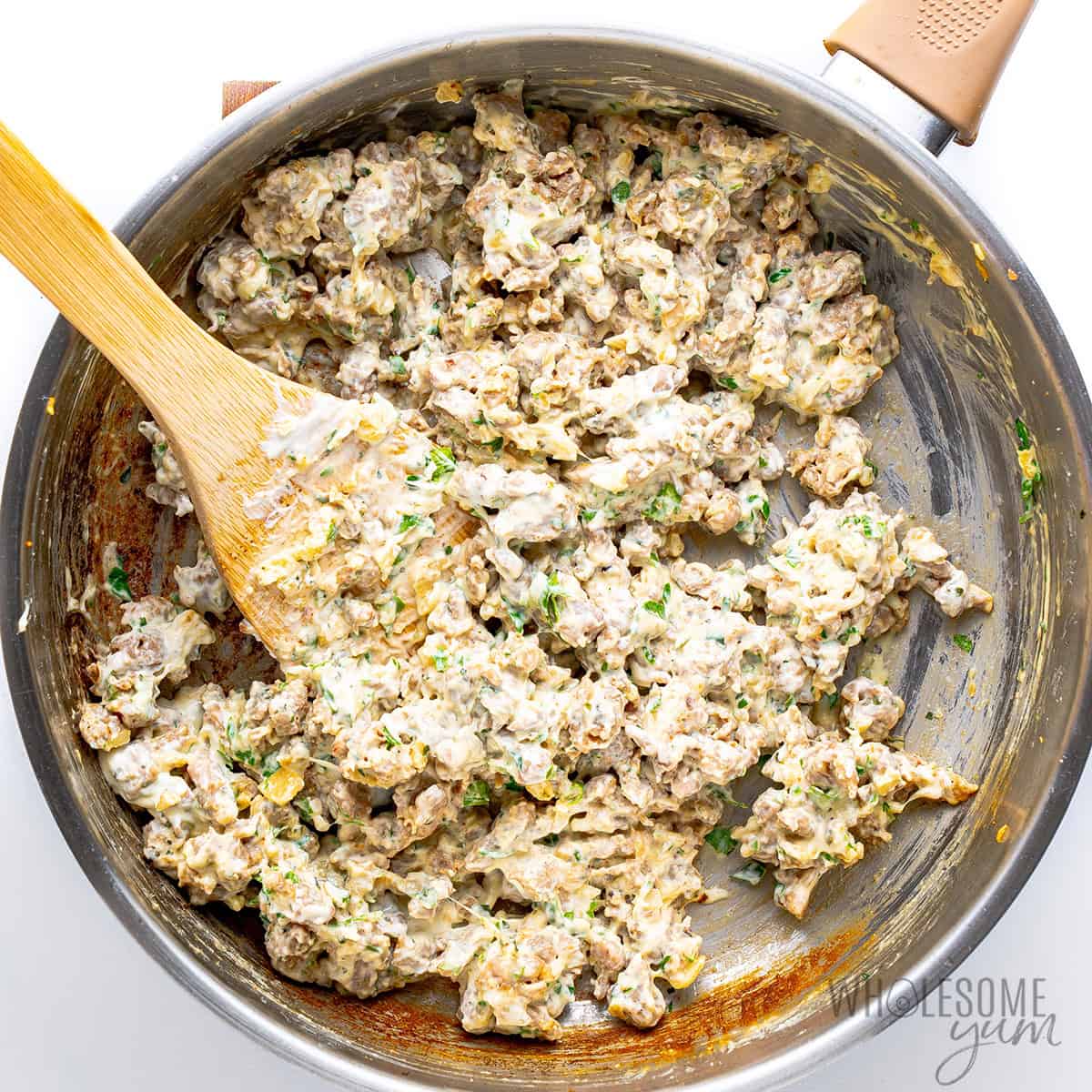 Cheese added to sausage mixture.