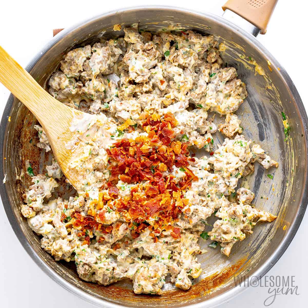 Crumbled bacon added to the stuffed mushroom filling.