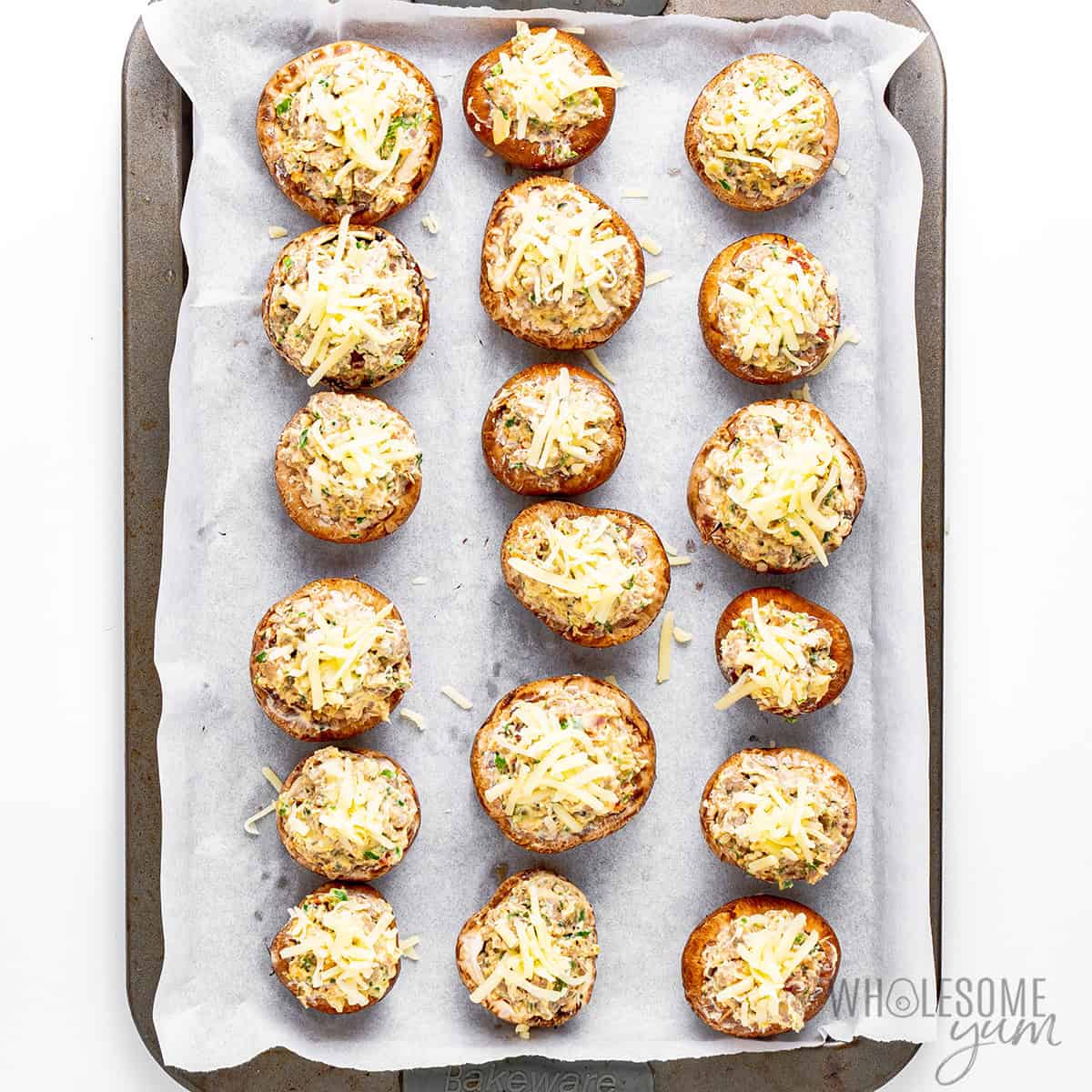 Stuffed mushrooms topped with cheese.