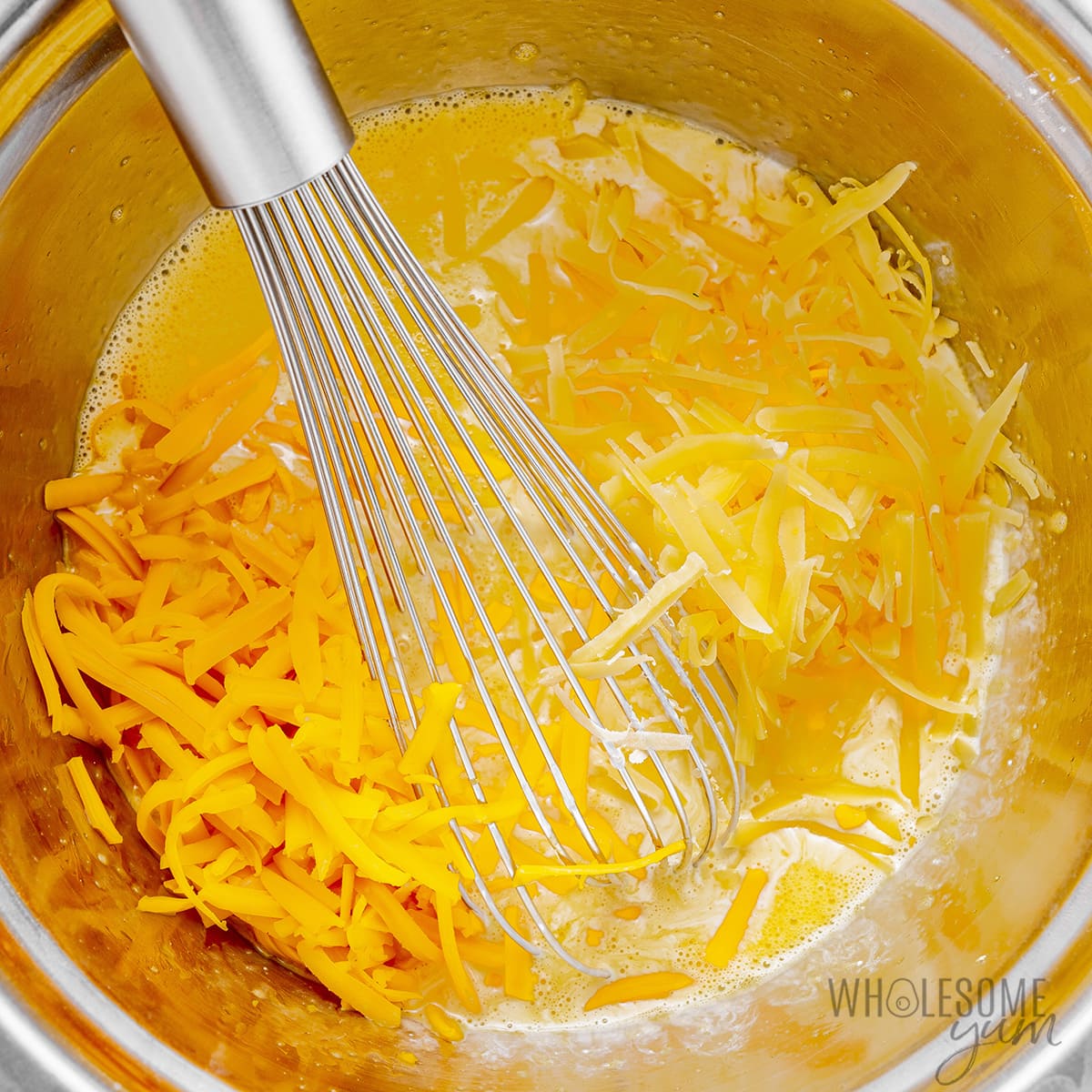 Cheese added to egg mixture.